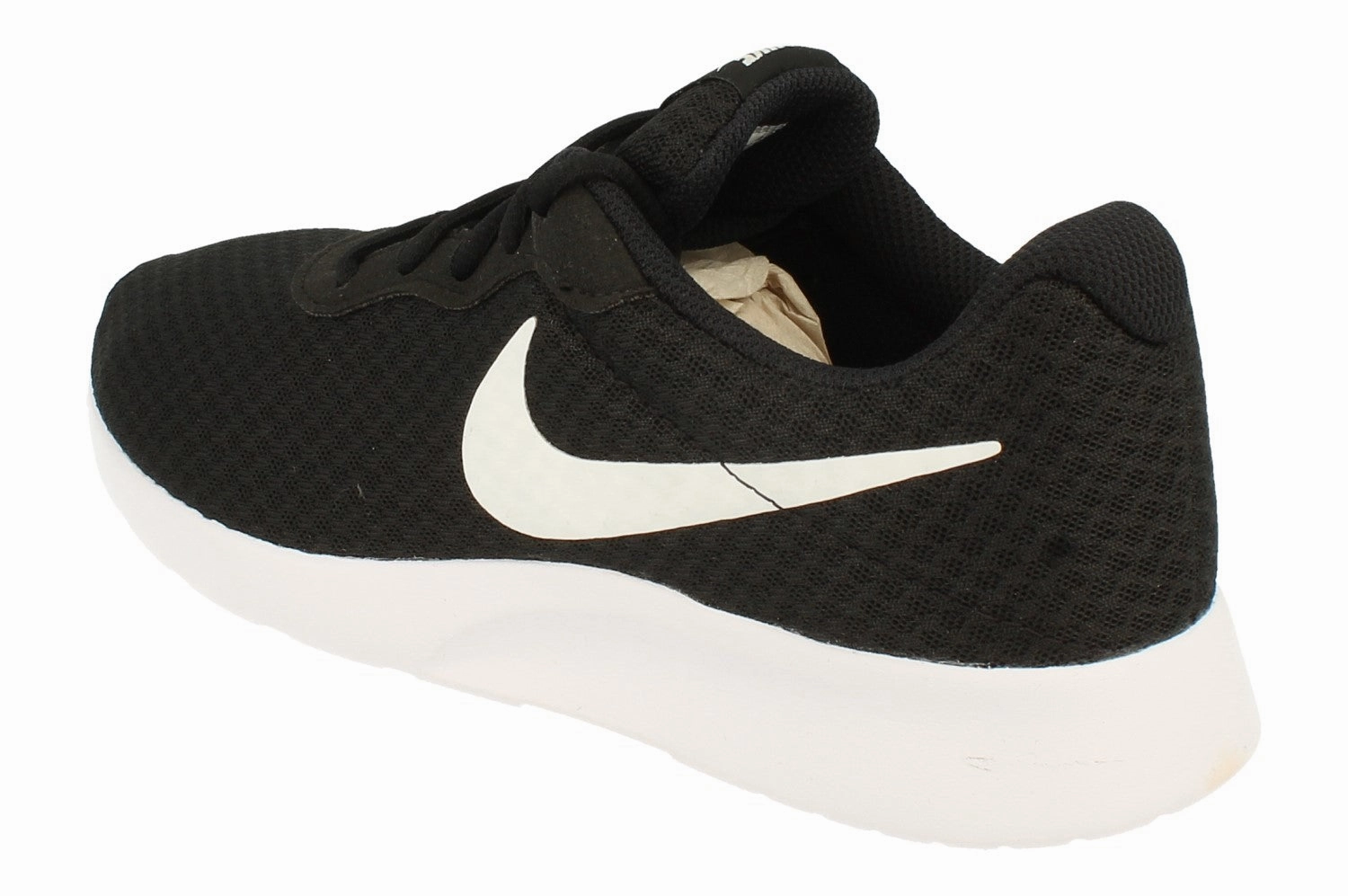 asphalt shoes running in an iconic bridge area shoes Nike Womens Tanjun 812655 011