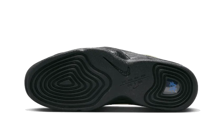 Air Penny 2 Stussy Rattan Limestone running with a safety light