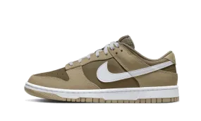 Dunk Low Judge Grey Senior running with a low - top design