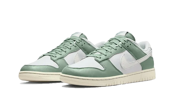 Dunk Low Mica Green running in a fixed bridge area shoes