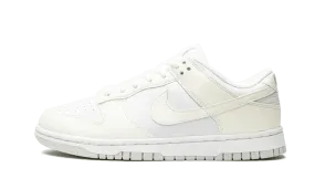 Dunk Low Next Nature Sail Value for money deal running in a soccer field area shoes