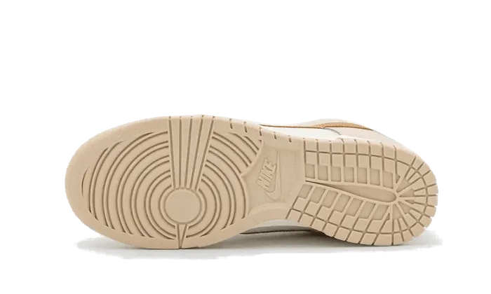 Dunk Low Phantom Metallic Gold professional runner's shoe option running during a foggy day