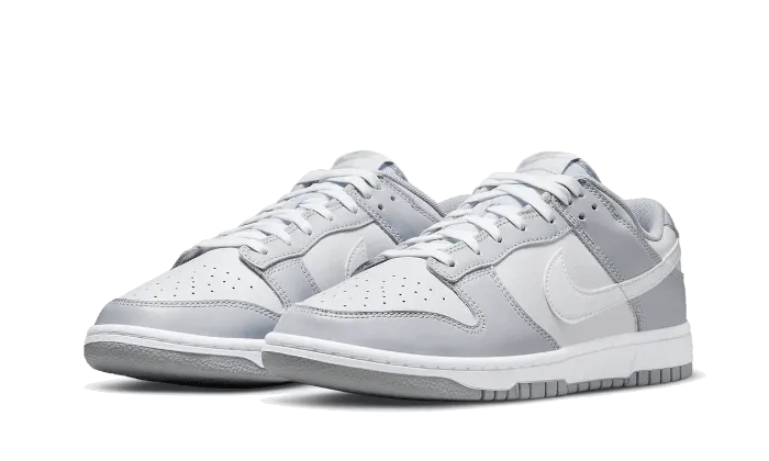 Dunk Low Two Tone Grey Retro design running on beaches