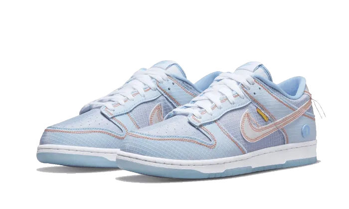 Dunk Low Union Passport Pack Argon running on flat ground