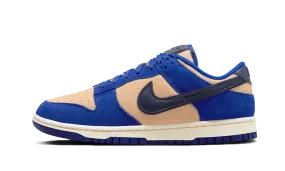 Dunk Low LX Blue Suede Birkenstock Arizona running in a coastal area