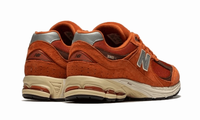 New Balance 2002R Rust Oxide Sleek Silhouette Ankle Strap
