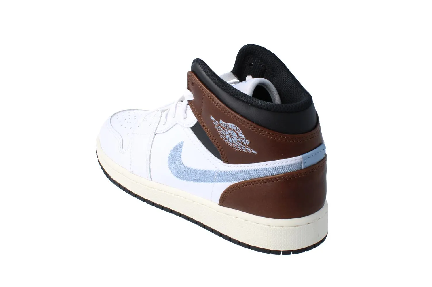 Nike Air Jordan 1 Mid SE GS Trainers Fq8162 142 running in a baseball field area shoes