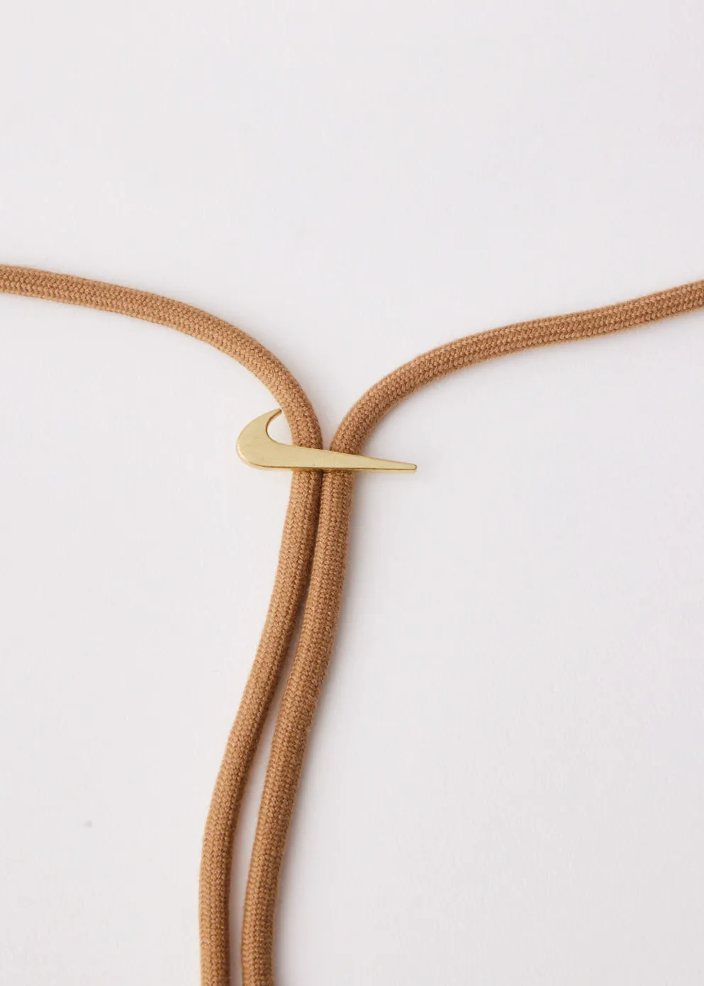 Metallic accents Nike Jacquemus Bob White