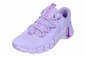 Nike Womens Free Metcon 5 Trainers DV3950 502 futuristic - style shoes running in a park trail