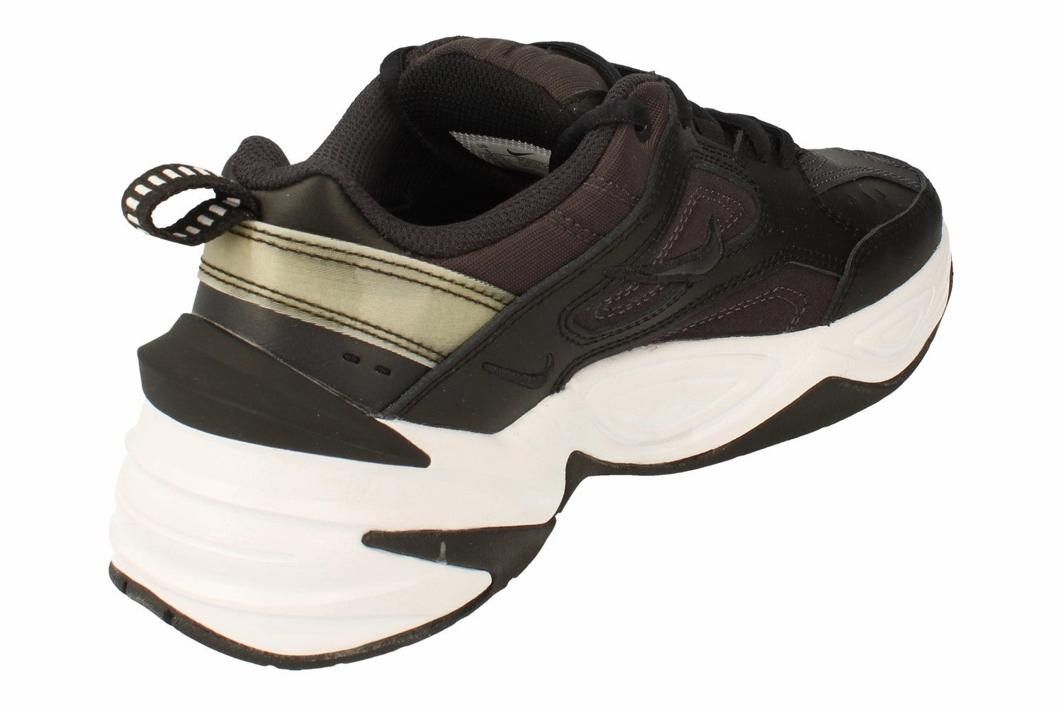 Nike Womens M2K Tekno BQ3378 002 running in a savannah area shoes