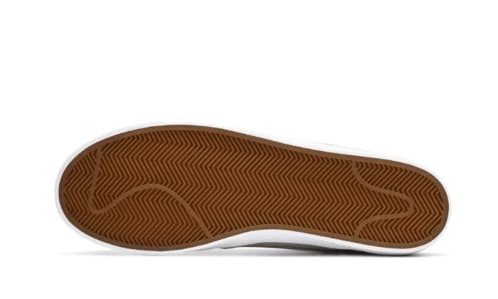 running in a snow - covered area shoes SB Blazer Low Medicom Toy (2020)