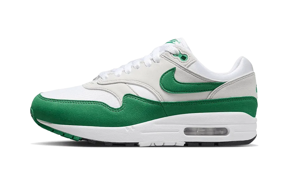 running in a beach area shoes Air Max 1 '87 Malachite