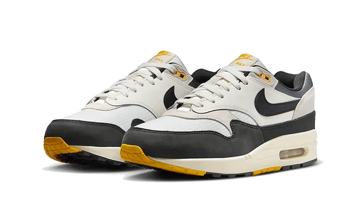 running in dark colors Air Max 1 Athletic Department