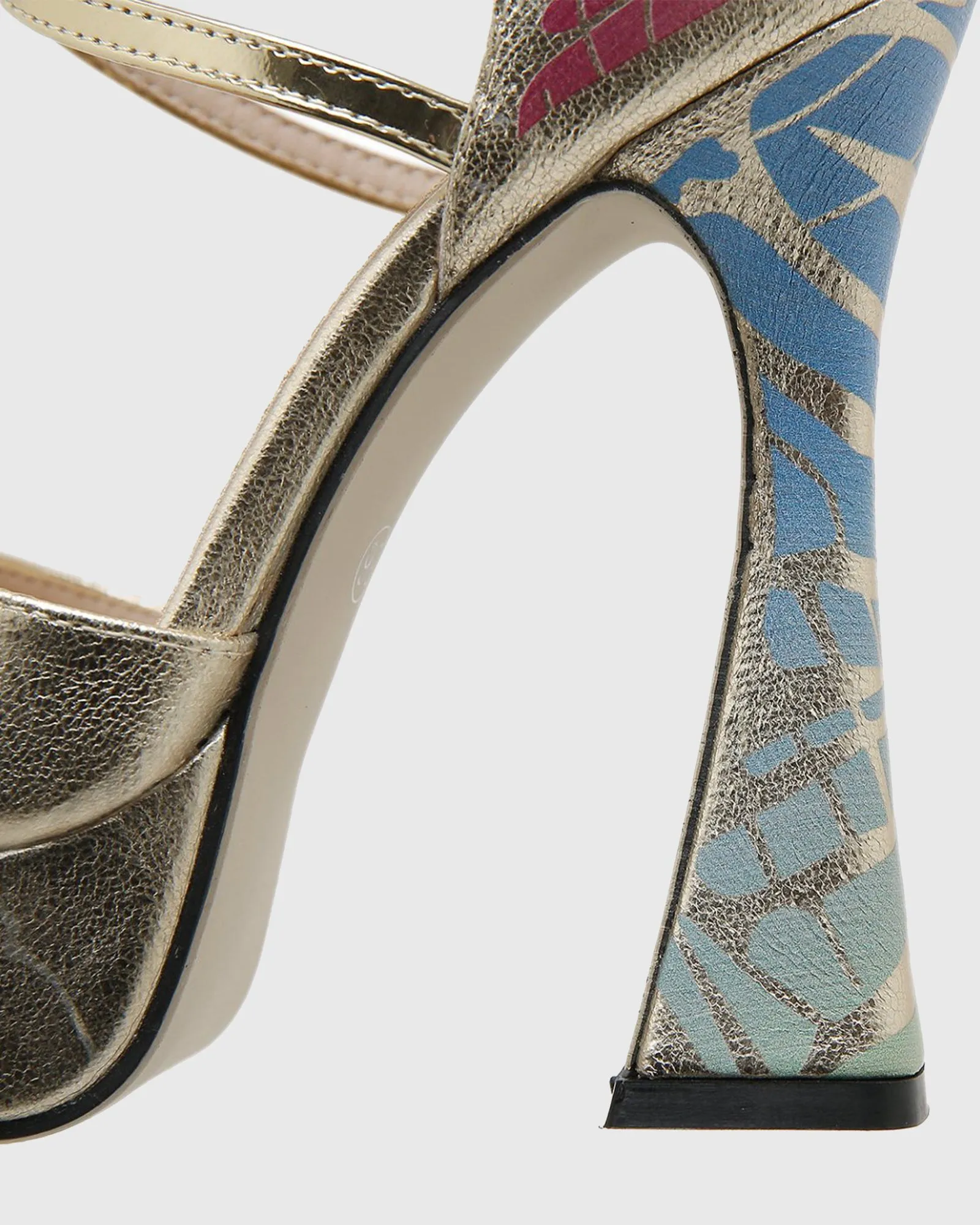Sarla Wing Cross Strap Platform Flared Heels In Gold