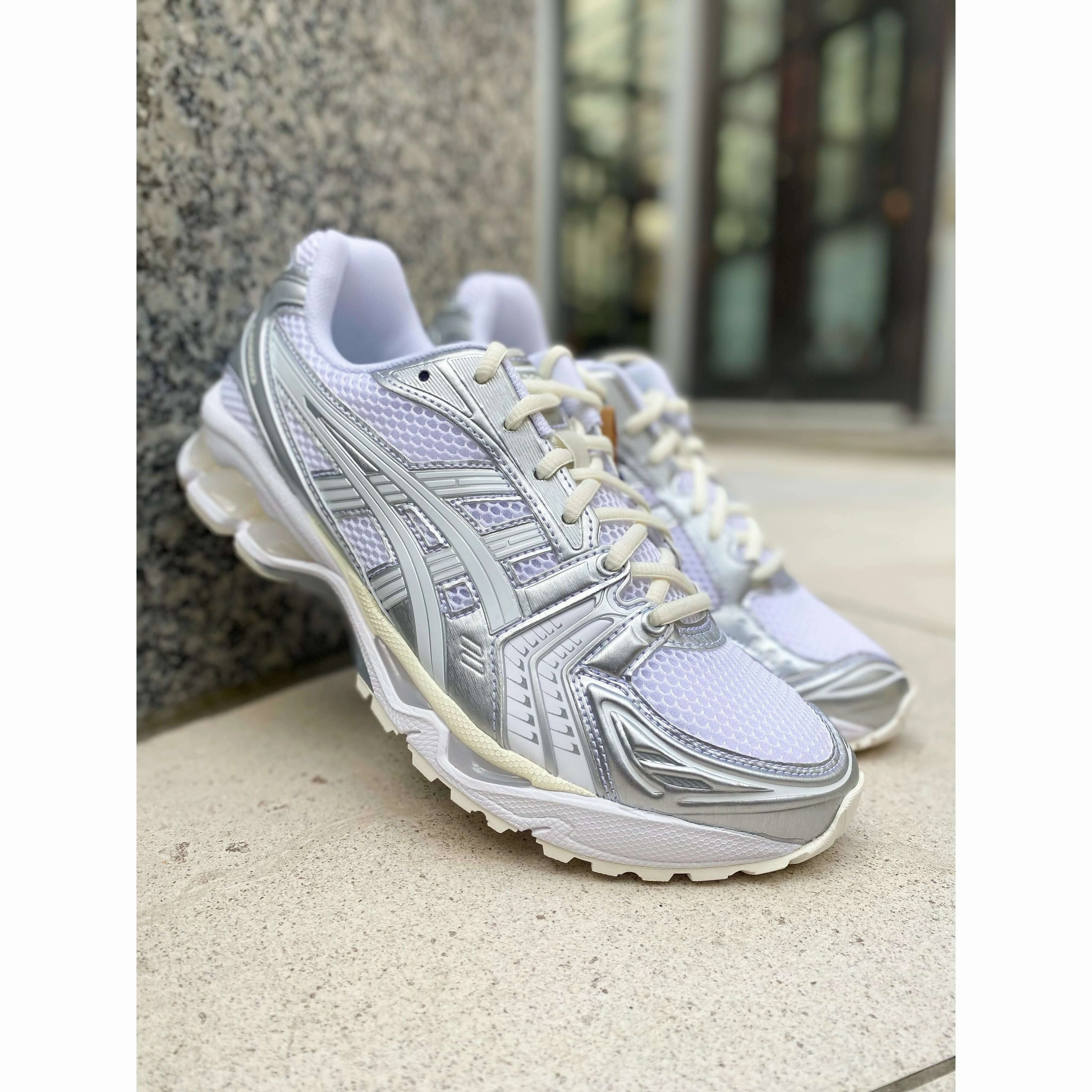 running with a high - top design ASICS Gel-Kayano 14 JJJJound Silver White