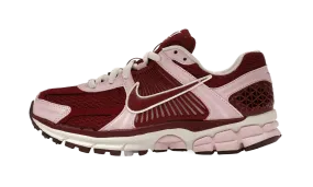 traction - control shoes mid - performance shoes Zoom Vomero 5 Pink Foam Team Red