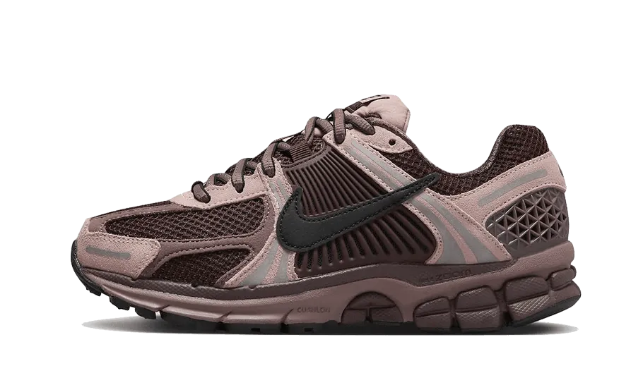 Zoom Vomero 5 Plum Eclipse running in a small town shoes street shoes